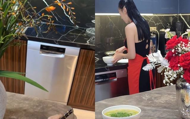 Khu bếp thiết kế tối giản, dát full đá phần đảo bếp và bàn nấu ăn, tạo cảm giác căn bếp luôn sáng bóng sạch sẽ. Ảnh: Chụp màn hình