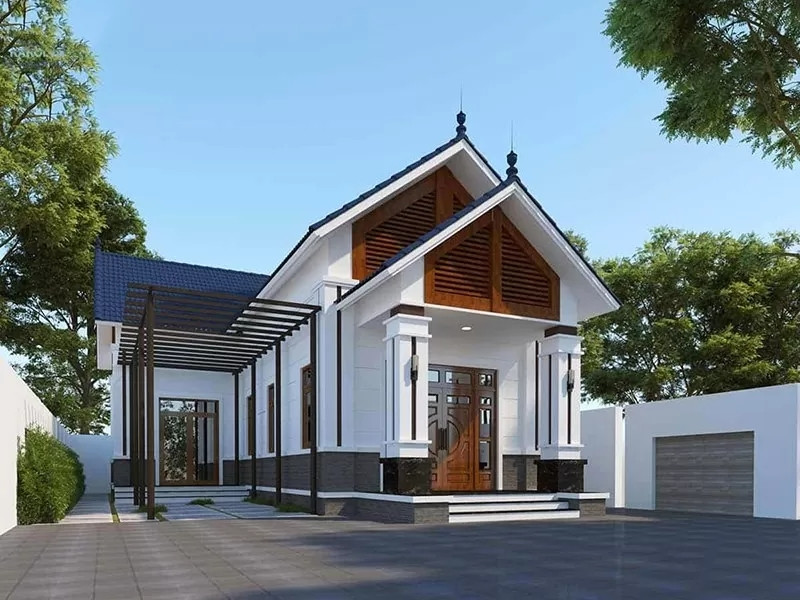 Nhà mái Thái xanh đen tận dụng không gian sân vườn, mang gió mát và ánh sáng len lỏi vào mọi khe hở bên trong. Ảnh: Vinavic 