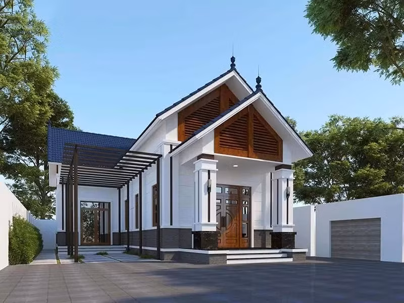 Nhà mái Thái xanh đen tận dụng không gian sân vườn, mang gió mát và ánh sáng len lỏi vào mọi khe hở bên trong. Ảnh: Vinavic 