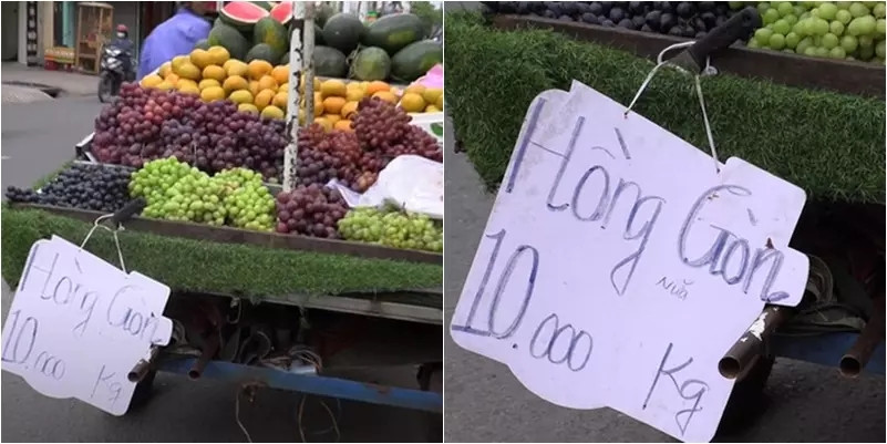 Tưởng hồng giòn 10.000/kg nhưng nhìn kỹ mới phát hiện ra chữ "nửa" nó bé hơn cả quả hồng. Ảnh: Vietnamnet