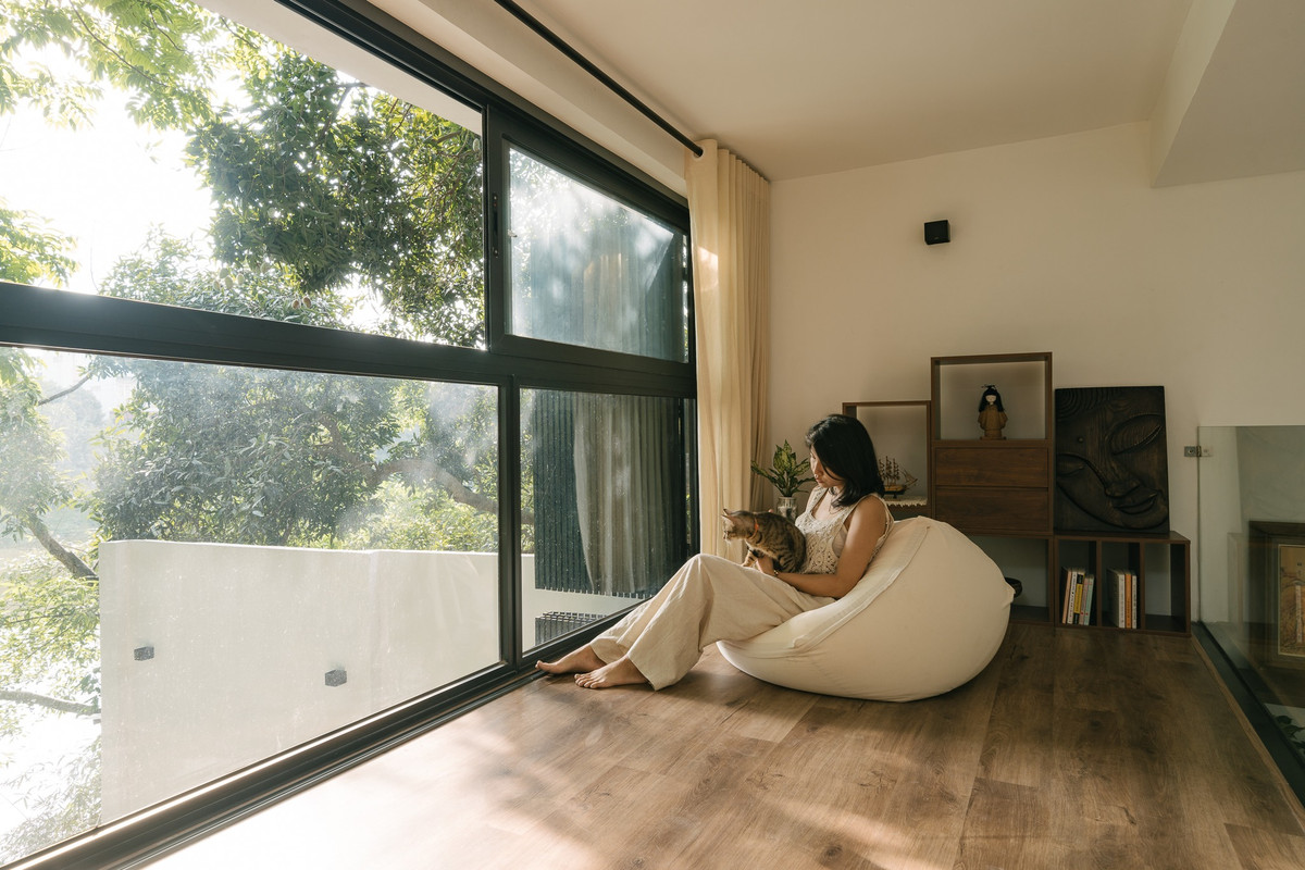 Gác lửng là nơi đọc sách, thư giãn và ngắm cảnh sông nước. Ảnh: Luke Nguyen Lab