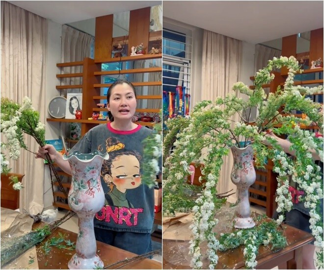 Ngọc Lan tự tay cắm bình hoa tiểu tú cầu trắng, kiểu dáng vòm buông rủ tự nhiên. Ảnh: FBNV