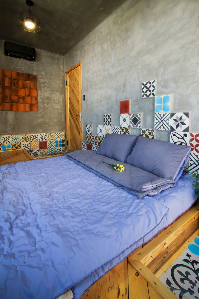 Phòng ngủ sử dụng gam màu lạnh. Ảnh: Ngô Duy