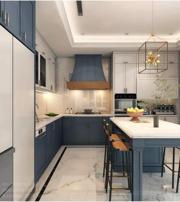 Phòng bếp hiện đại với gam màu trắng - xanh chủ đạo. Ảnh: FBNV