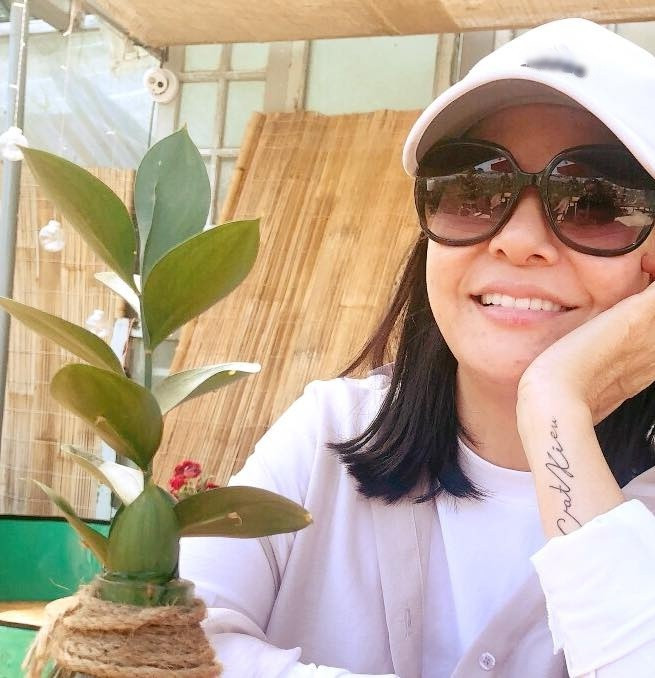 Cat Phuong khoe hinh xam, khang dinh tinh yeu voi Kieu Minh Tuan