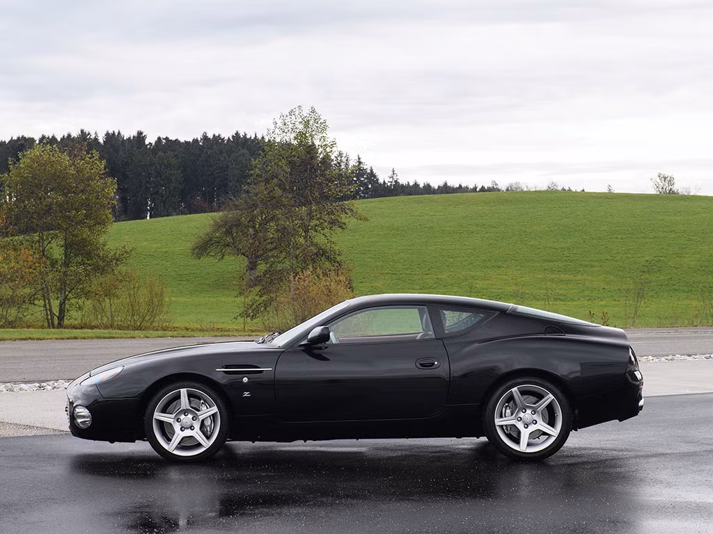 Được ra đời trong thời kỳ Aston Martin đang thuộc sở hữu của Ford, động cơ này về cơ bản là 2 cỗ máy Duratec V6 từ các dòng xe Ford "bình dân" được ghép lại với nhau. Toàn bộ sức mạnh của động cơ được truyền tới cầu sau thông qua hộp số sàn 6 cấp Tremec T56, giúp DB7 Zagato chỉ mất 5,1 giây để tăng tốc từ 0-100 km/h và đạt tốc độ tối đa 305 km/h.