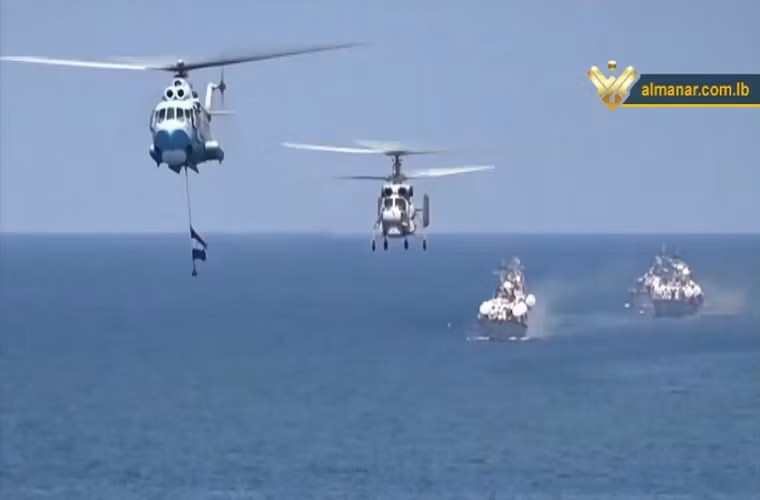 Hình ảnh trực thăng Mi-14PL và Ka-25 của Hải quân Syria, bên dưới là biên đội tàu tên lửa Osa-II. Nguồn ảnh: almanar.com.