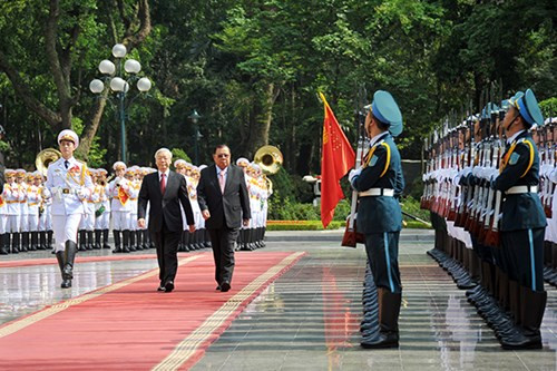 Tổng bí thư BCH TƯ Đảng Cộng sản Việt Nam Nguyễn Phú Trọng đón tiếp Tổng bí thư, Chủ tịch nước Cộng hoà dân chủ nhân dân Lào Bounhang Vorachit đến thăm chính thức Việt Nam (ảnh ANTĐ).
