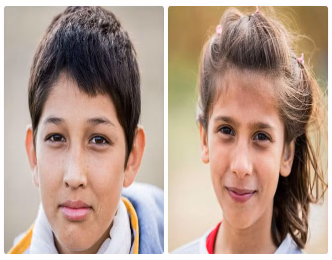 Những em nhỏ Afghanistan mỉm cười trước ống kính khi cùng gia đình tới “miền đất hứa”.