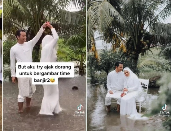 Cap doi Malaysia gay sot mang voi bo anh cuoi giua mua lu