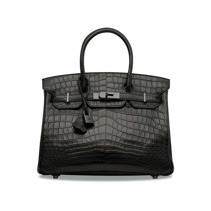 Túi Matte Black Niloticus Crocodile Hermès Birkin 5,1 tỷ đồng: Được thiết kế theo phong cách sang trọng và cổ điển, Hermes Matte Crocodile Birkin được làm bằng da cá sấu. Tại phiên đấu giá gần đây, Hermès Birkin bán với số tiền nhiều hơn dự kiến, 232.244 USD.