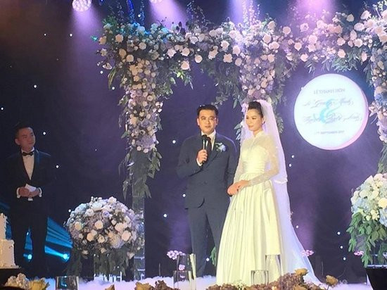 BTV Quang Vinh và nhà văn Linh Lê trong đám cưới.