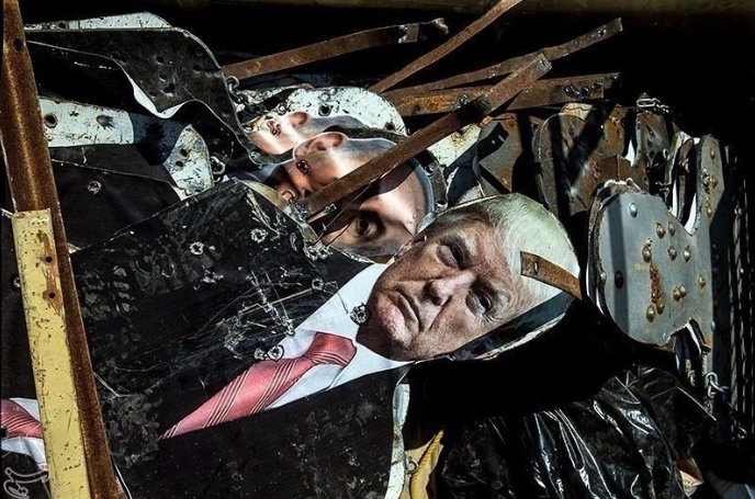 Những bức chân dung của Tổng thống Donald Trump được sử dụng làm bia tập bắn với chi chít lỗ đạn sau mỗi buổi huấn luyện của Vệ binh Hồi giáo Iran. Nguồn ảnh: QQ.