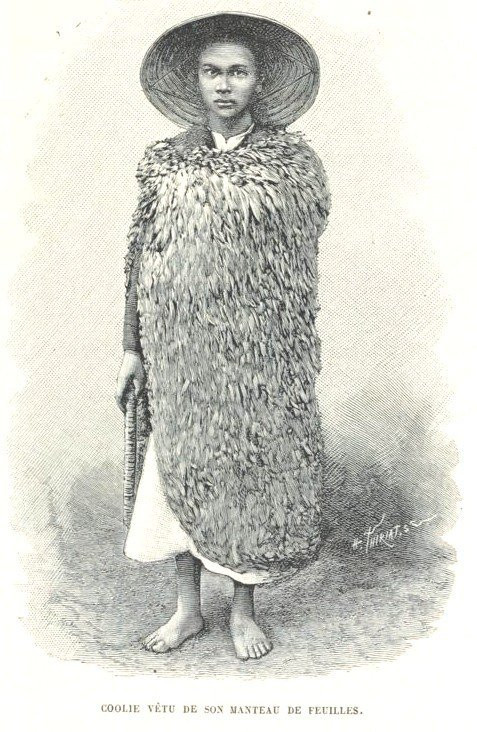 Anh "cu li" (coolie - người lao động chân tay mang tính chất nặng nhọc) khoác áo tơi.