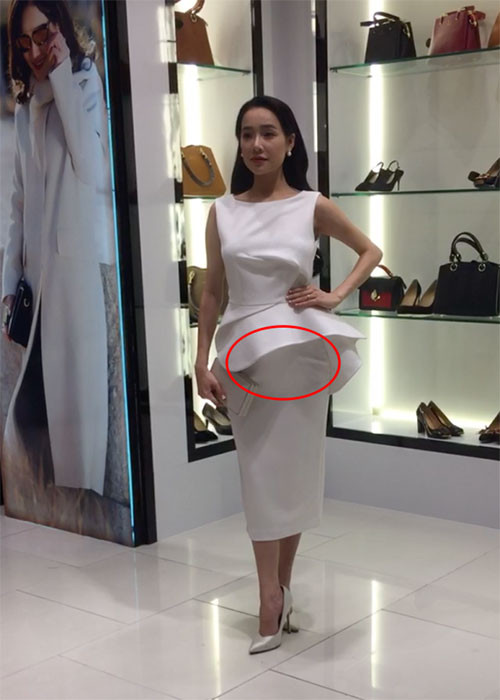 Xuất hiện trước công chúng, Nhã Phương liên tục mặc trang phục che vòng 2. Ảnh: Ngoisao