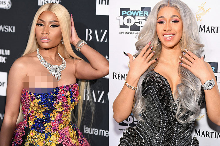 Sau khi bị một vệ sĩ thụi cùi chỏ vào trán, Cardi ẩu đả với Nicki. Ảnh: Getty