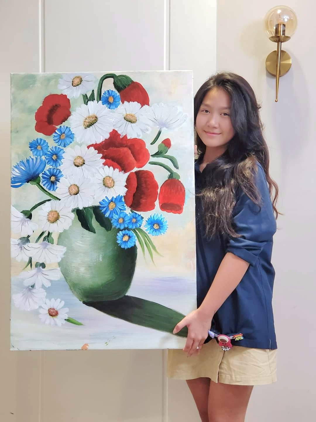 Cô bé cũng thể hiện khả năng của mình trong lĩnh vực hội họa.