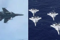J-15 mang tên lửa hành trình YJ-15 (bên trái) và các tiêm kích J-15 hoạt động từ tàu sân bay Liêu Ninh và Sơn Đông