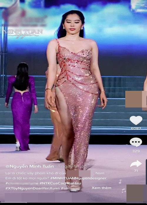 NTK Nguyễn Minh Tuấn - người thiết kế chiếc váy mà Nam Em trình diễn bênh vực người đẹp. Cụ thể, Nguyễn Minh Tuấn cho biết, chất liệu vải nặng của chiếc váy dễ quấn vào chân người mặc, đường xẻ cao quyến rũ, tôn dáng nhưng dễ gây ra nhiều sự cố nhạy cảm, thêm vào đó Nam Em diễn trên một sân khấu cao nên thái độ khá lúng túng, không thật sự thoải mái khi trình diễn là điều hoàn toàn có thể thông cảm. Ảnh: Yan