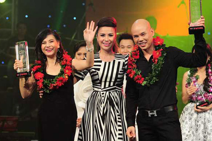 Năm 2013, nữ nghệ sĩ cùng ca sĩ Phan Đinh Tùng giành giải bạc chương trình Cặp đôi hoàn hảo. Ảnh: VTC