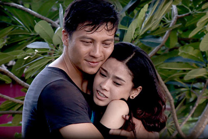 Trương Quỳnh Anh từng có những cảnh tình tứ với Dương Hoàng Anh trong bộ phim "Săn vàng" lên sóng năm 2014. Ảnh: Khám phá