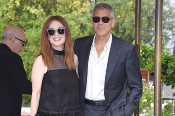 George Clooney điển trai dự LHP Venice: Tài tử phim 13 tên cướp thế kỷ là khách danh dự của LHP Venice hàng năm. (Dân trí)