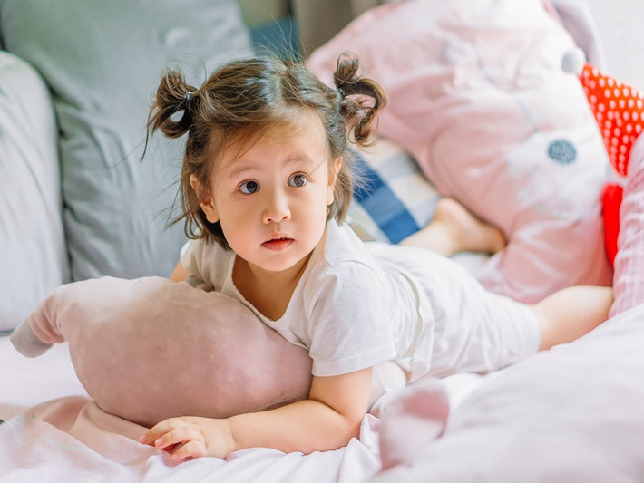 Bé Tết được búi tóc Na Tra nên bị hiểu nhầm là con gái.