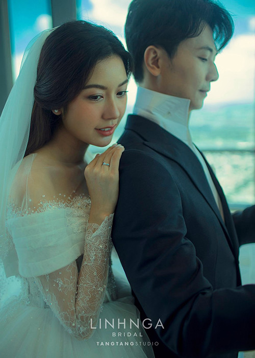 Á hậu Thúy Vân và doanh nhân Nhật Vũ vừa chia sẻ bộ ảnh cưới theo phong cách "Mây và mặt trời". Ảnh: Kul