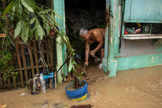 Cảnh ngập lụt nghiêm trọng ở Philippines vì bão Yagi - Hình 3 Canh ngap lut nghiem trong o Philippines vi bao Yagi-Hinh-3