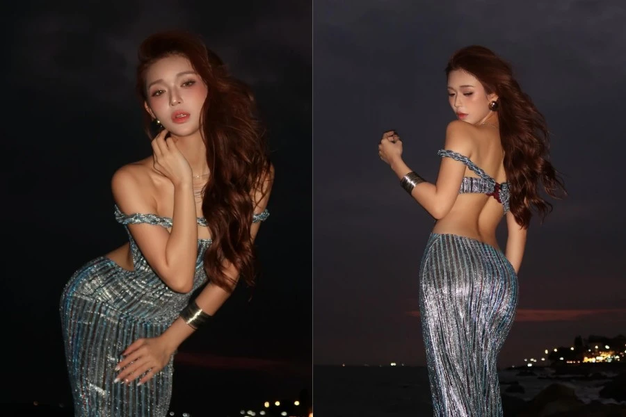 Hot girl Hoàng Yến diện váy cắt xẻ khoe dáng 'đồng hồ cát' trên biển đêm