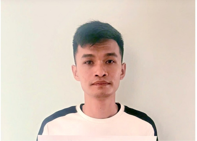 Trần Triệu Quí tại cơ quan công an - Ảnh: CA quy-1.png