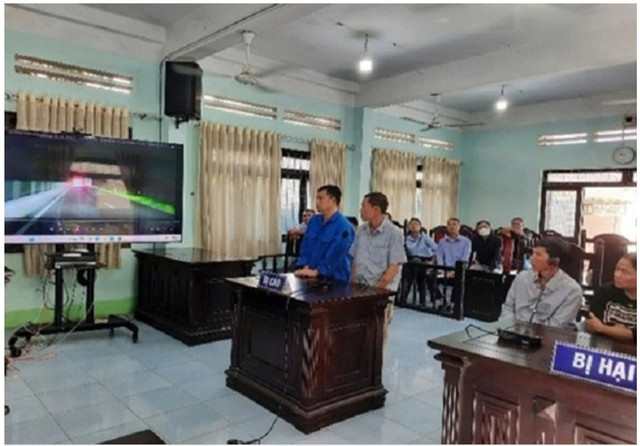 Bị cáo Nguyễn Thọ Huy và Trần Trương Thái tại phiên tòa. Ảnh CA bi-cao-nguyen-tho-huy-va-tran-truong-thai-tai-phien-toa.png