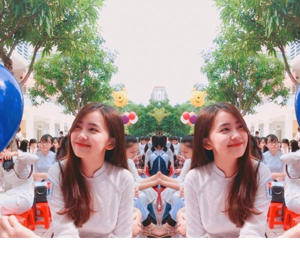 Nữ sinh trong loạt ảnh này thực sự dễ khiến các các chàng trai, nam sinh cảm mến ngay từ cái nhìn đầu tiên. Trong tà áo dài trắng tinh khôi, cô nàng khoe nụ cười cực duyên cùng khuôn mặt rất ưa nhìn, đáng yêu. Khung cảnh sân trường và màu sắc rực rỡ cũng khiến loạt ảnh thêm hấp dẫn. Nhân vật chính sau đó đã nhận được vô vàn lời khen từ cư dân mạng. Nhiều chàng trai thậm chí nóng ruột muốn truy lùng thông tin, trang cá nhân của cô nàng để được làm quen, được ngắm nghía thêm nhiều bức ảnh đẹp khác.