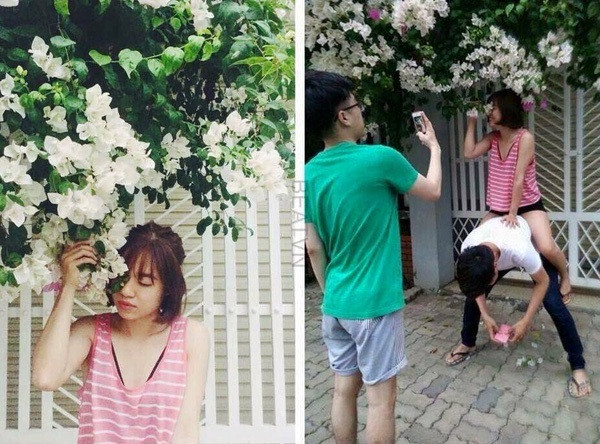 Chụp ảnh với giàn hoa giấy ở trên cao, người mẫu quá thấp không thể với tới... Không thành vấn đề! Chỉ cần sự trợ giúp của một chàng trai, cùng với việc chọn góc ảnh che lấp toàn bộ phần bên dưới, cô gái đã có được một bức ảnh vô cùng ưng ý.