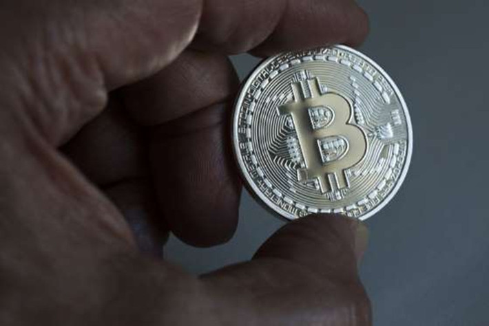 Sự ra đời của tiền ảo Bitcoin: Bitcoin được tạo ra bởi Satoshi Nakamoto vào năm 2008 nhưng tới năm 2010, người này rời khỏi dự án và biến mất, để lại mọi thứ cho những kỹ sư khác làm. “Ngày ra đời” của Bitcoin là 3/1 khi Nakamoto “đào” 50 đơn vị đầu tiên. Ảnh: Getty Images.