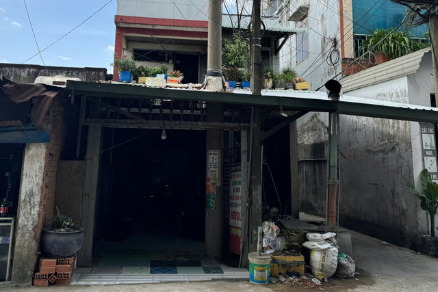 Căn nhà của bà Lê Thị H. nơi phát hiện bộ xương trong bồn chứa nước trên mái nhà. Ảnh: A.X v2.jpg