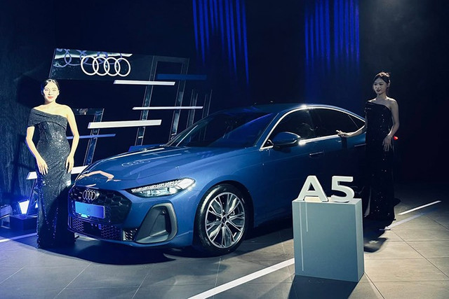 Audi A5 thế hệ mới gây ấn tượng với thiết kế coupe trên thân sedan tạo diện mạo liền mạch và thể thao, nội thất sở hữu công nghệ hiện đại... 2-4067.jpg