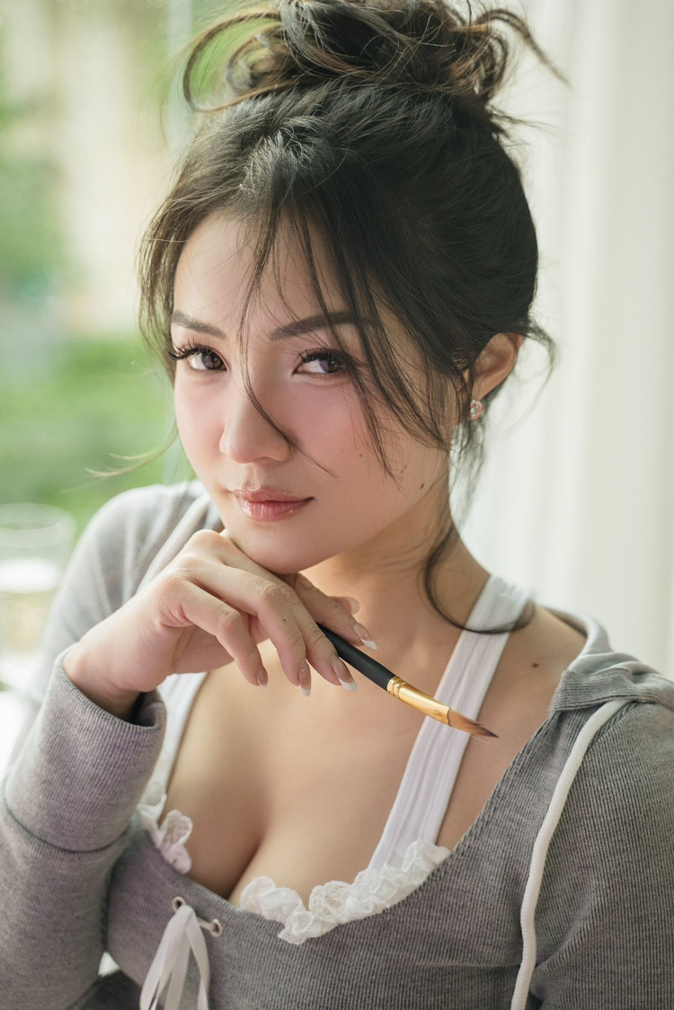 Thủy Top là một trong những hot girl đời đầu nổi tiếng. Song song đó, cô còn được yêu mến bởi rất cuồng thể thao. d5.jpg