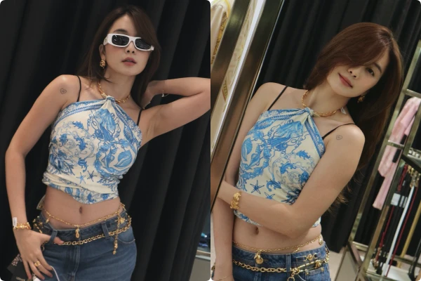 Chị gái Thiều Bảo Trâm dùng khăn làm áo, khoe dáng gợi cảm