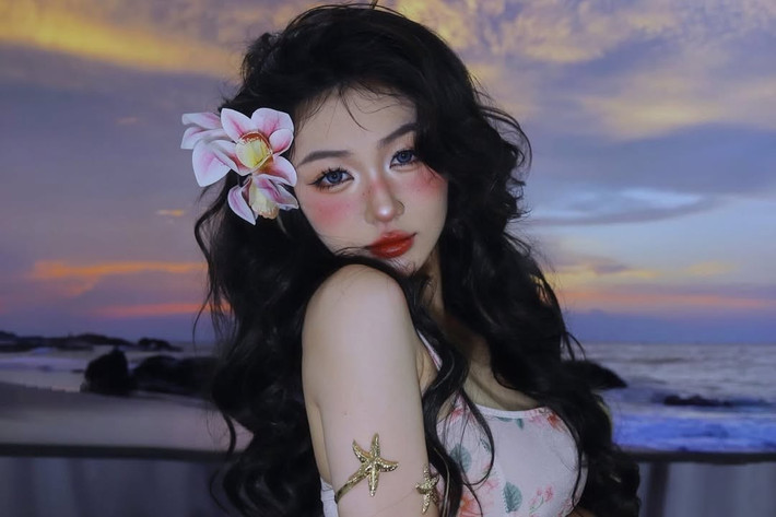 Cô nàng khéo léo kết hợp trang phục với background, từ ánh hoàng hôn lãng mạn đến bình minh trên biển, tạo nên những khung hình đẹp như tranh vẽ, khiến fan không khỏi xuýt xoa.
