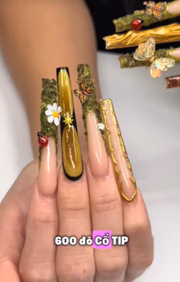 Dù gây nhiều tranh cãi, không thể phủ nhận bộ nail Valentine đã thành công rực rỡ trong việc thu hút sự chú ý và chứng minh rằng: Trong thế giới làm đẹp, sự sáng tạo là không có giới hạn, và đôi khi sự sáng tạo đó không đi đôi với tính tiện dụng. (Ảnh trong bài TikTok @phoebemgaiduanails)
