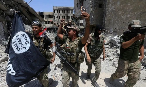 Ảnh: Lính Iraq ăn mừng chiến thắng ở Mosul 