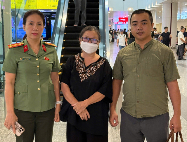 Nguyễn Thị Kim Oanh bị bắt giữ và di lý đối tượng từ thủ đô Viêng Chăn, Lào về Việt Nam 999.jpg