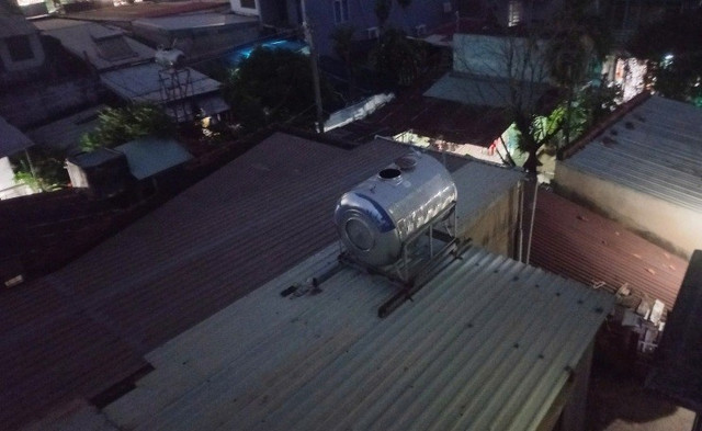 Chiếc bồn nước, nơi phát hiện vụ việc 777766.jpg