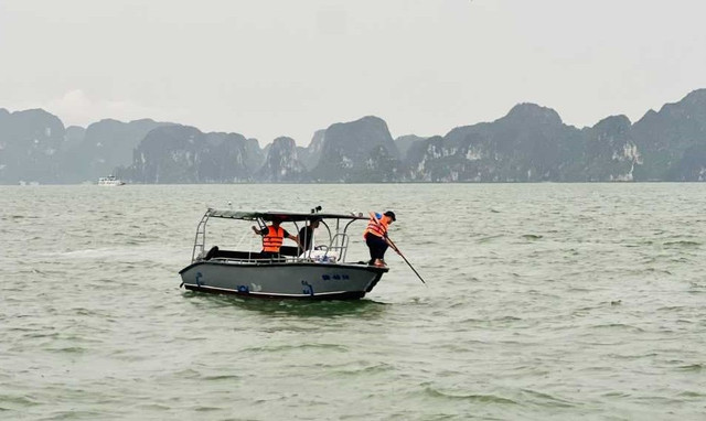 Lực lượng chức năng tỉnh Quảng Ninh tìm kiếm cứu nạn. 09998.jpg