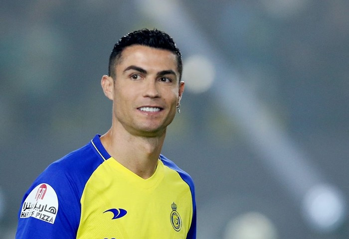Sau khi chuyển đến Saudi Pro League vào tháng 1/2023, Cristiano Ronaldo trở thành cầu thủ được trả lương cao nhất trong lịch sử bóng đá với mức lương hàng năm khoảng 200 triệu USD. Ảnh: Reuters