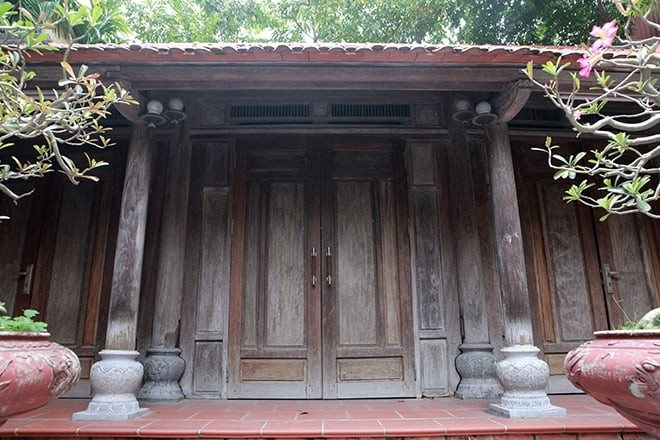 Ngôi nhà rộng khoảng 50m2, toàn bộ khung nhà hoàn toàn bằng gỗ sưa đỏ, quý hiếm. Ảnh: Dân Việt