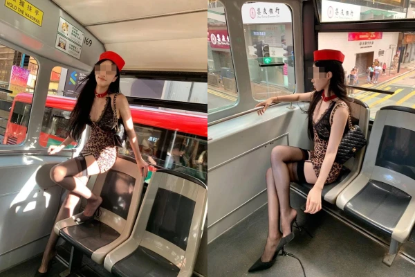 Diện váy cực bó, tạo dáng trên xe buýt cô gái gây tranh cãi