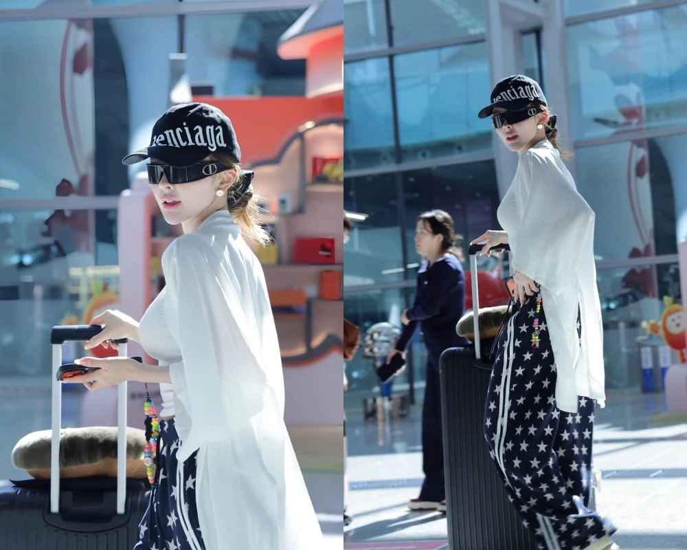 Soi outfit ra sân bay của hot girl thị phi Trang Nemo