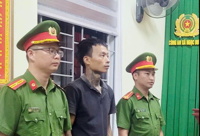 Đối tượng Lý Quốc Đồng tại cơ quan Công an. capture.png